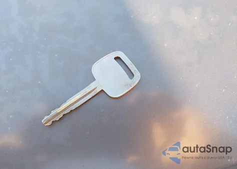 2003 Toyota Corolla Ce z USA, uszkodzony, nr VIN 1NXBR32E03Z165547